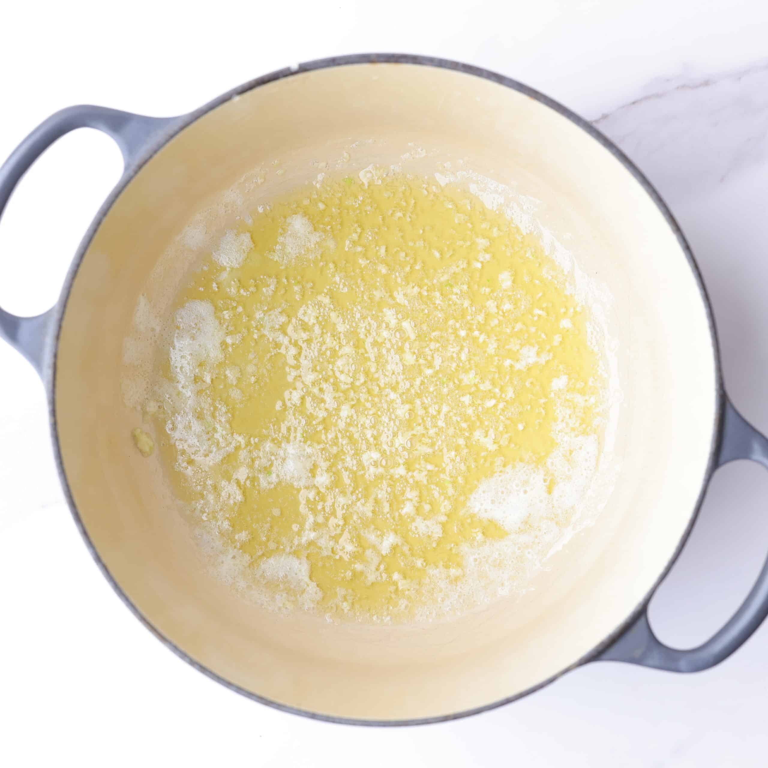 Melted butter in a medium pot.