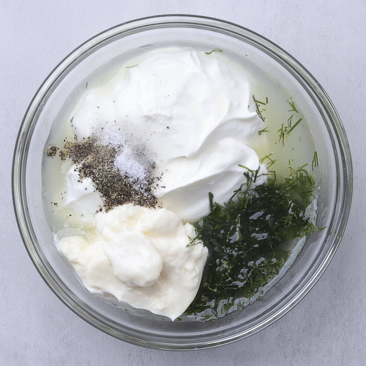 A small bowl with all of the ingredients in it prior to mixing them.