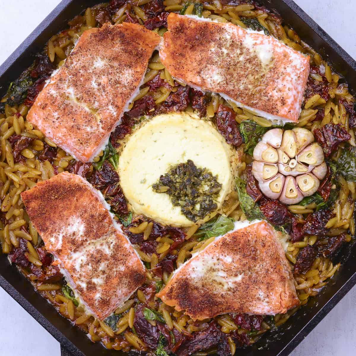 A skillet with the baked Salmon Pasta in it prior to mixing it together.