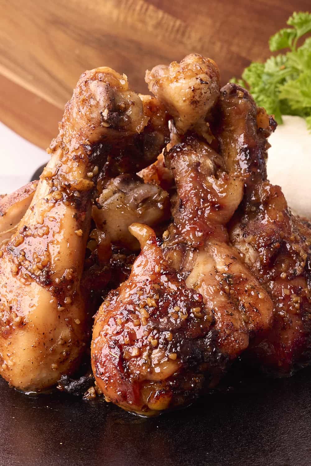 Sticky Chicken Drumsticks on a Cast Iron Platter
