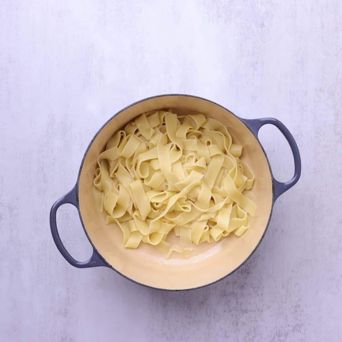 Cooked pasta in a pot for the Halibut Pasta recipe.