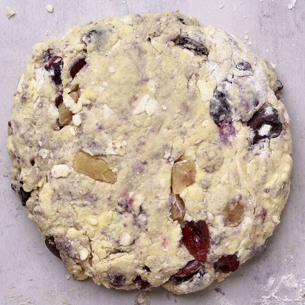 An 8 inch disc formed from the cherry scone batter.
